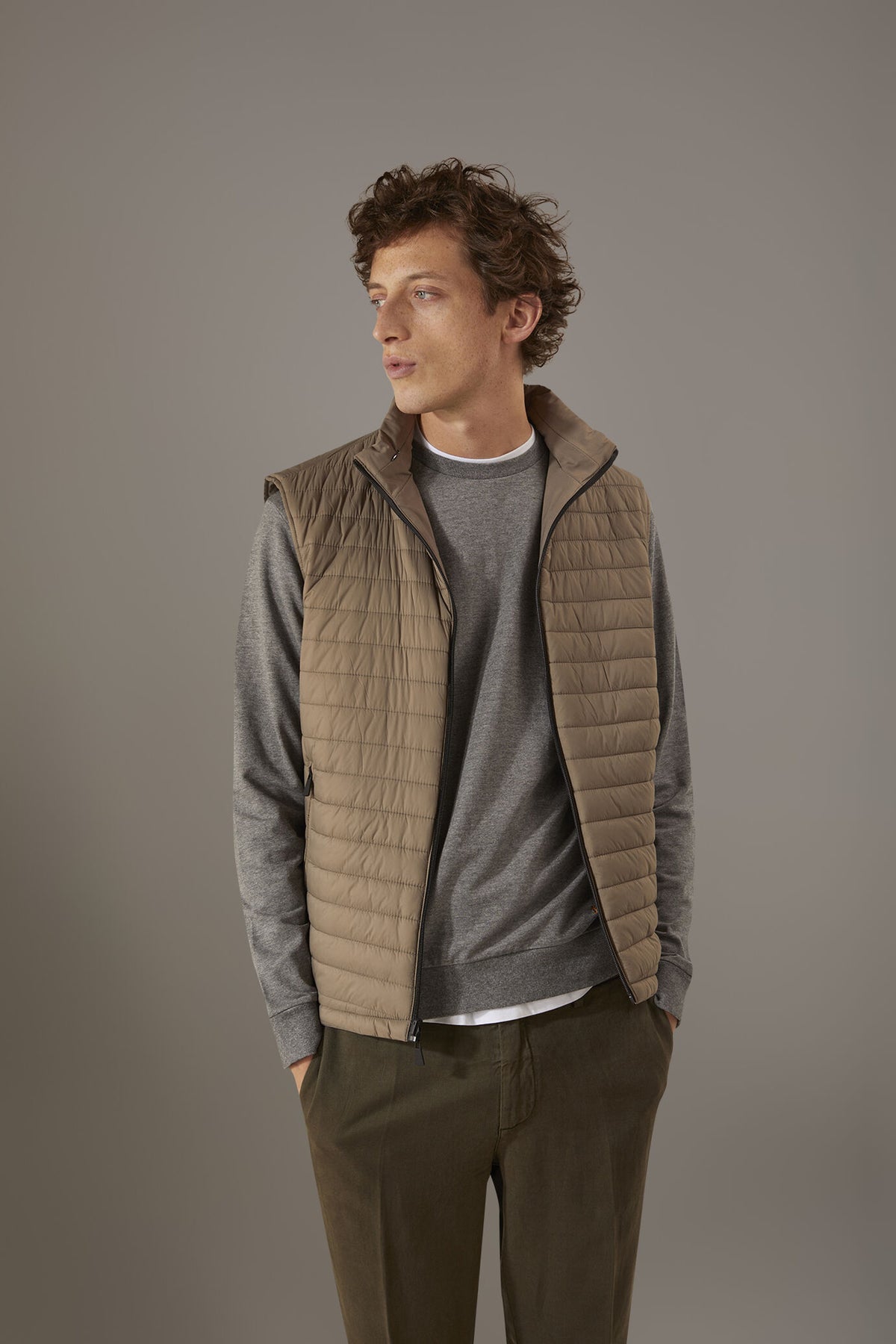 Reversible gilet with storm hood