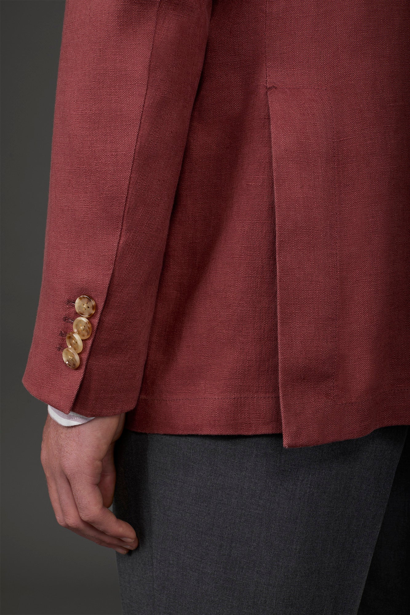 Men's unlined single-breasted jacket with classic lapels and patch pockets