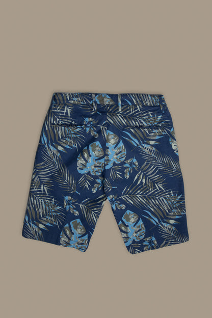 Chino bermuda twill construction with green leaves print