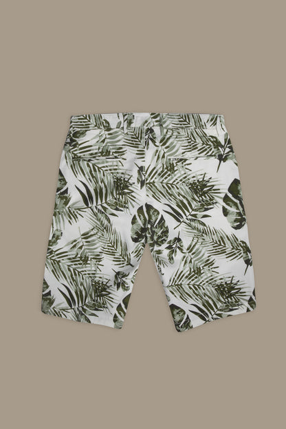 Chino bermuda twill construction with green leaves print
