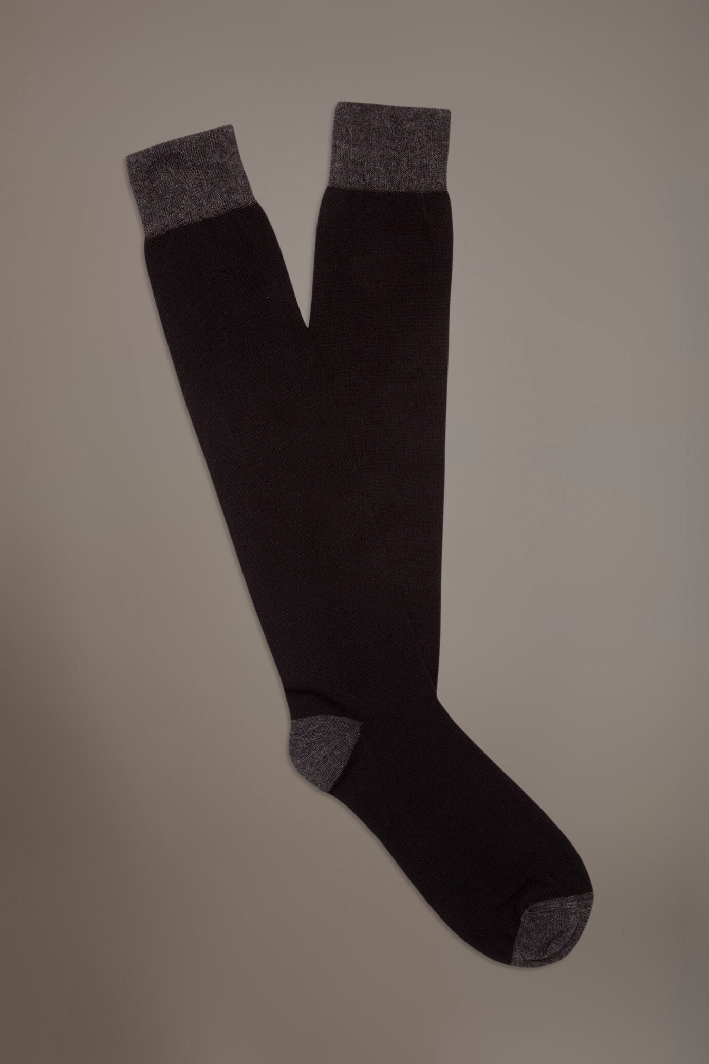 Long solid color socks in stockinette stitch made in Italy