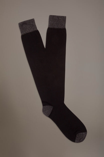 Long solid color socks in stockinette stitch made in Italy