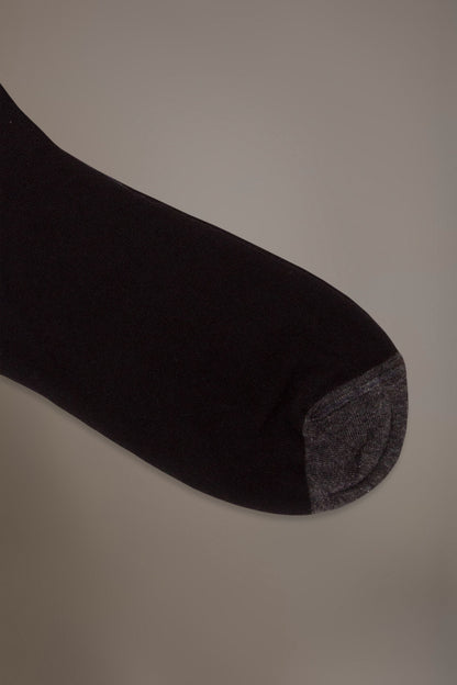 Long solid color socks in stockinette stitch made in Italy