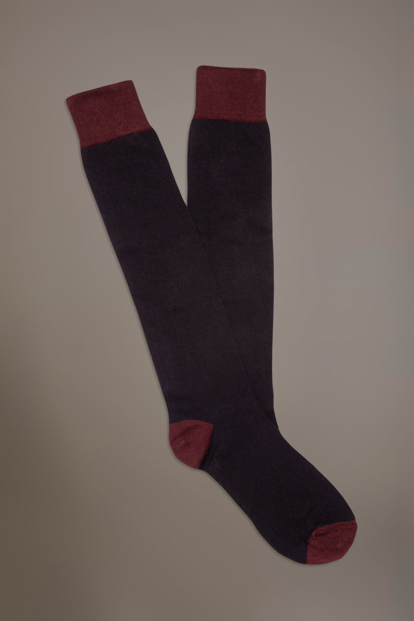 Long solid color socks in stockinette stitch made in Italy