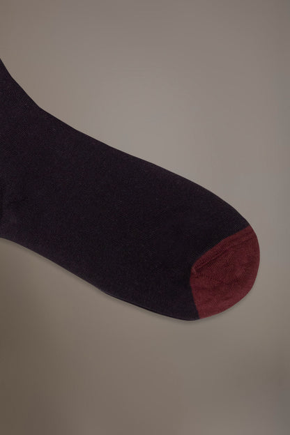 Long solid color socks in stockinette stitch made in Italy
