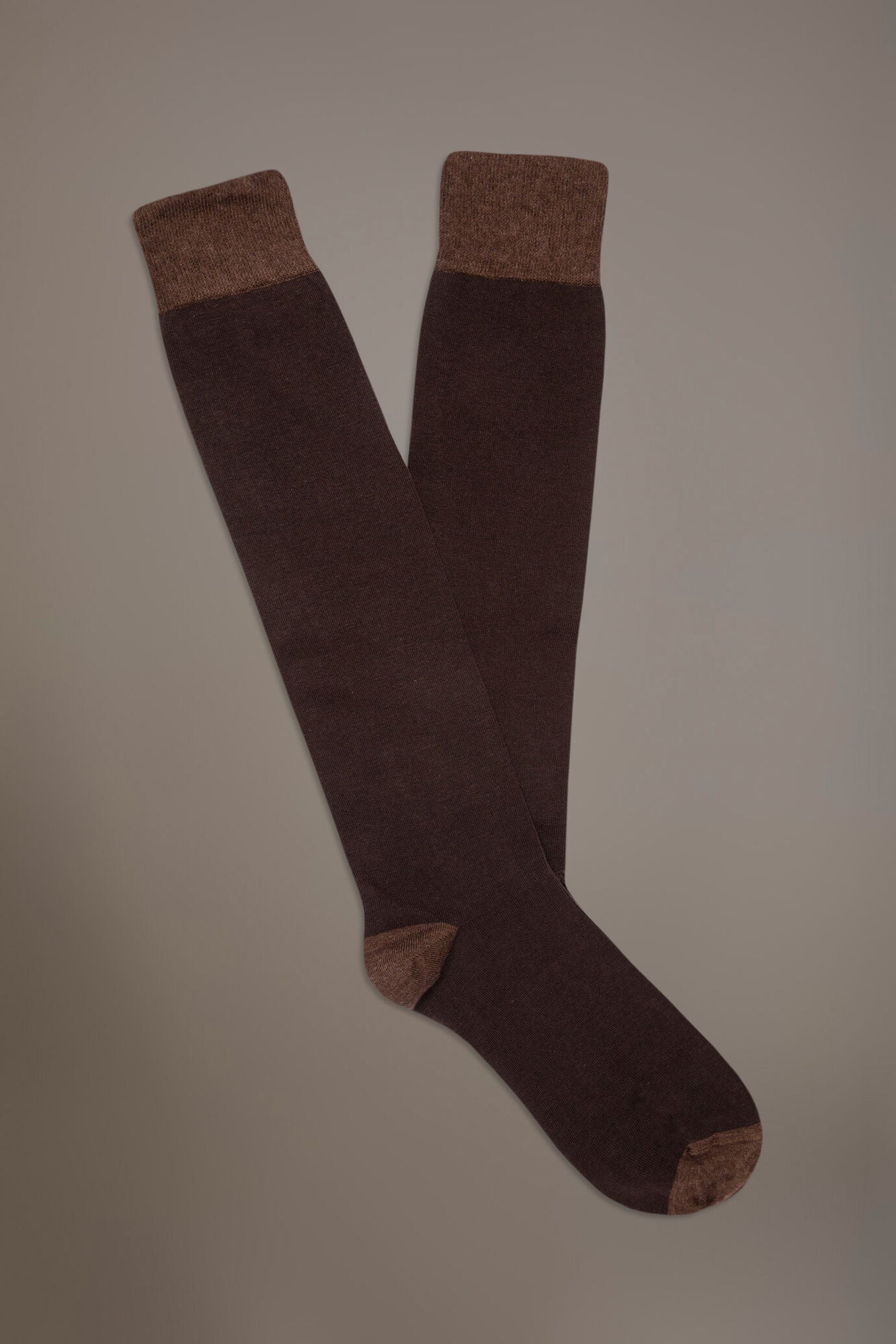 Long solid color socks in stockinette stitch made in Italy