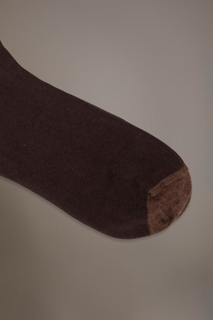 Long solid color socks in stockinette stitch made in Italy