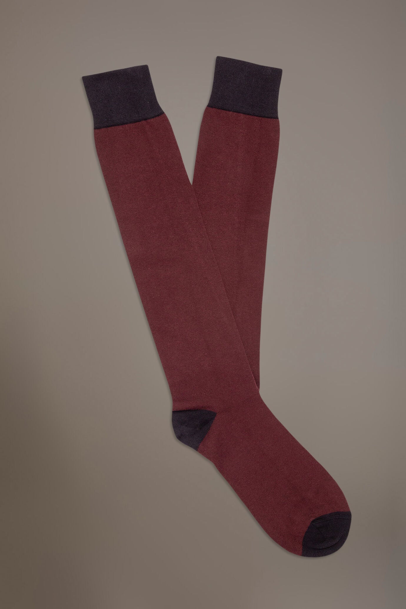 Long solid color socks in stockinette stitch made in Italy