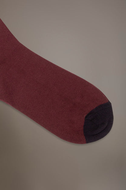 Long solid color socks in stockinette stitch made in Italy