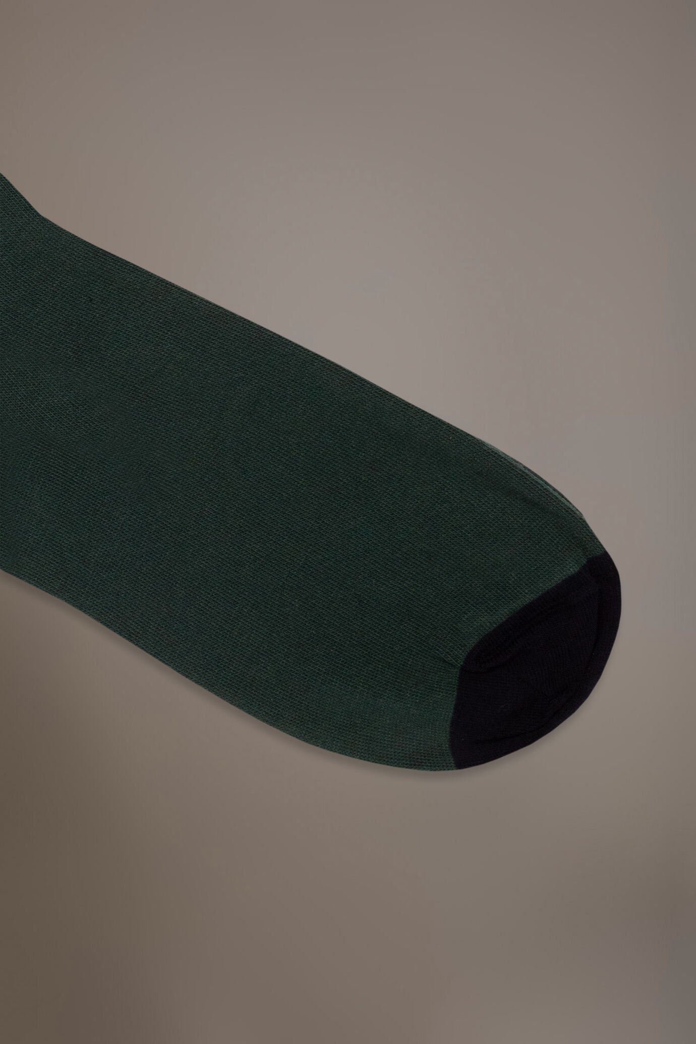 Long solid color socks in stockinette stitch made in Italy