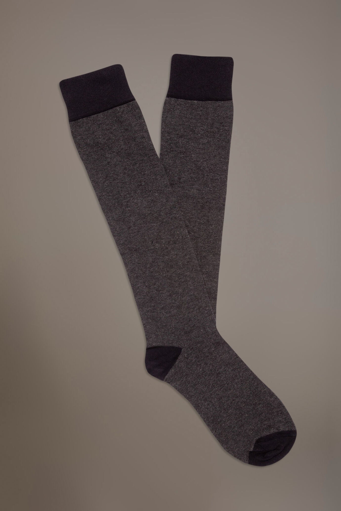 Long solid color socks in stockinette stitch made in Italy