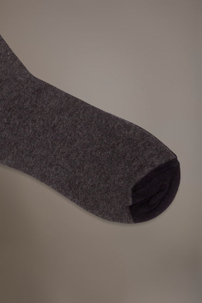 Long solid color socks in stockinette stitch made in Italy