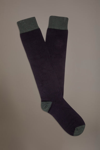 Long solid color socks in stockinette stitch made in Italy