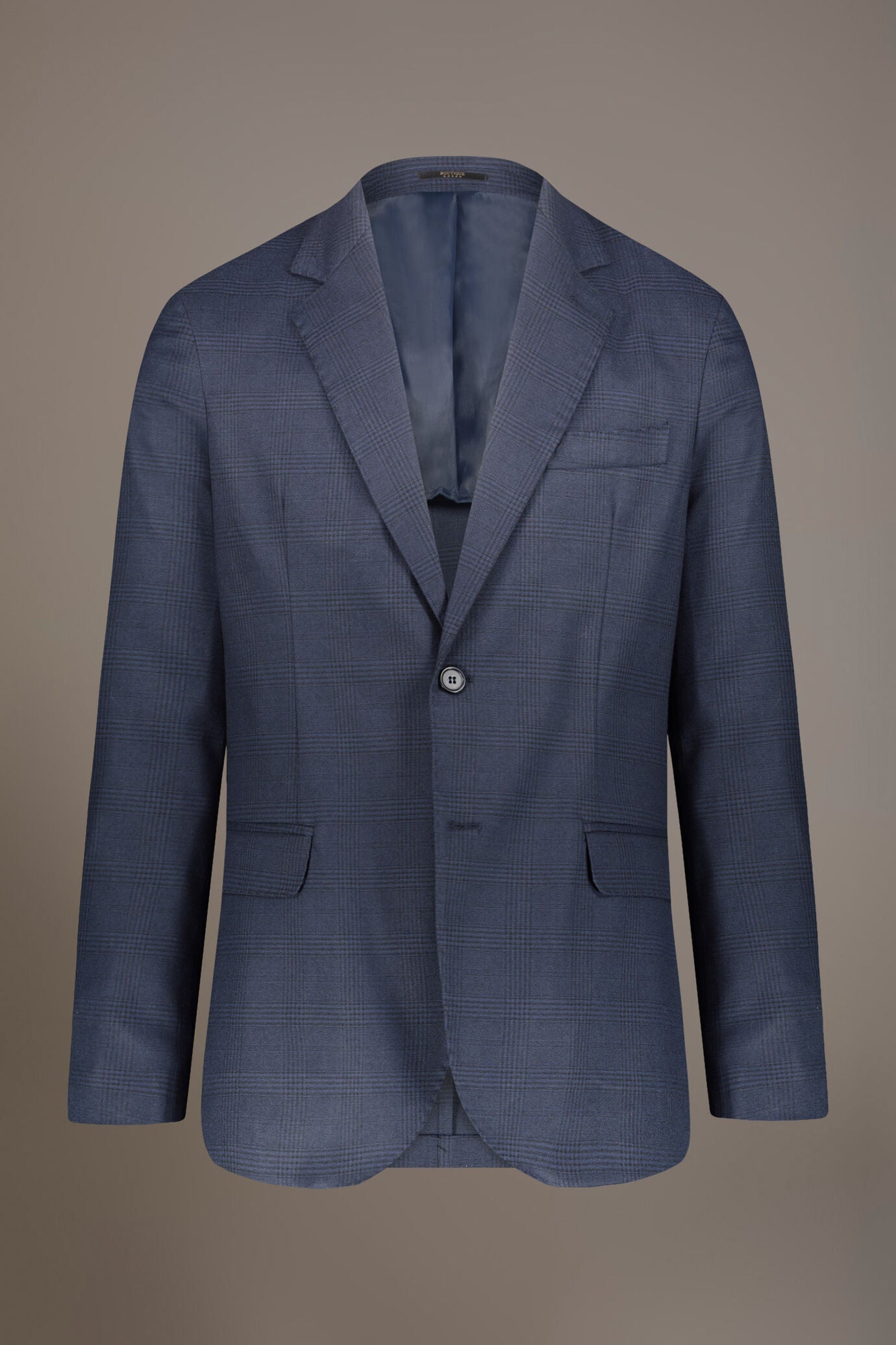 Single-breasted jacket with flap pockets in prince of wales fabric made in Italy