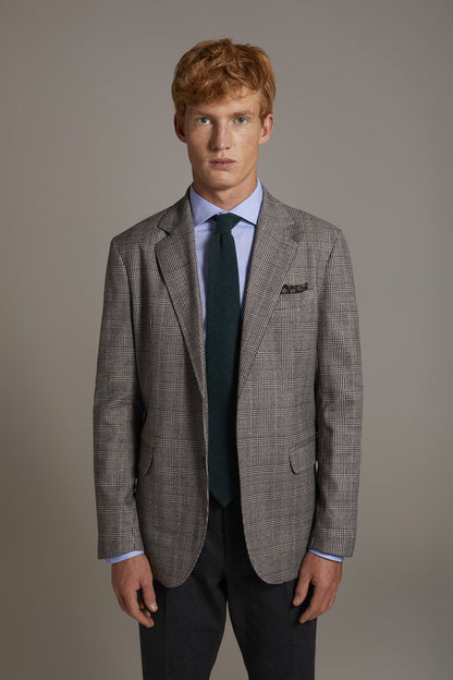 Single-breasted jacket with flap pockets in prince of wales fabric made in Italy
