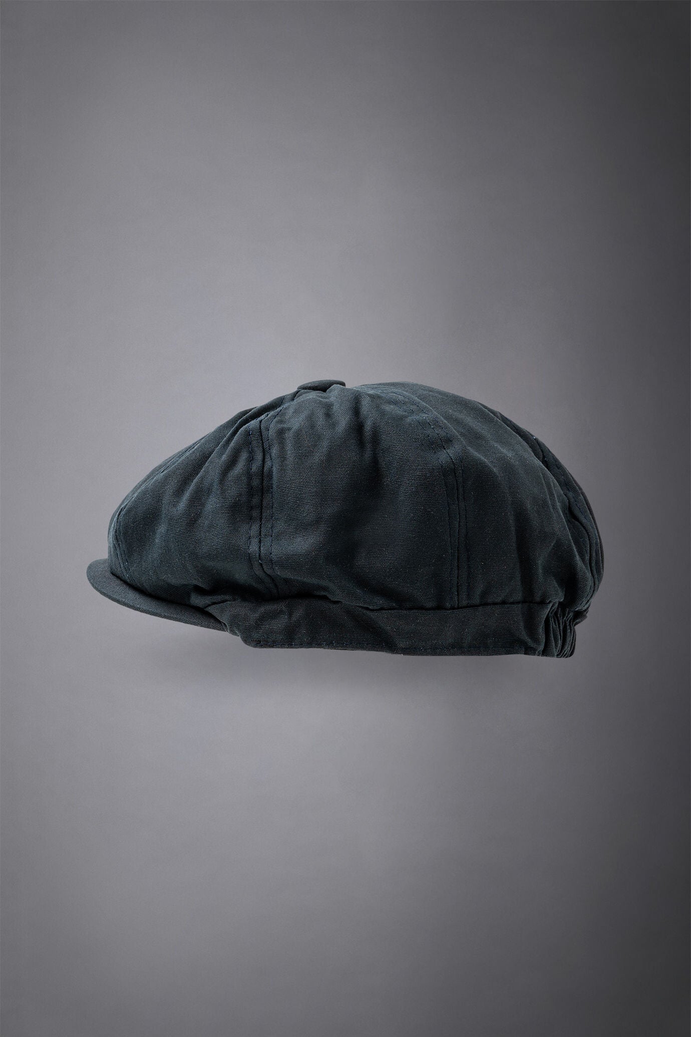 Men's flat cap in waxed fabric