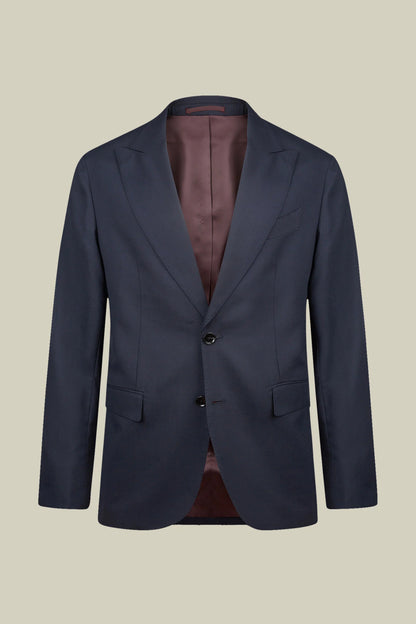 Men's regular fit single-breasted suit featuring a jacket with peak lapels in wool blend fabric
