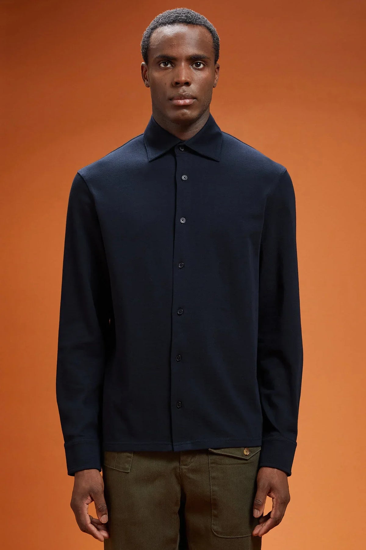 Men's long-sleeved 100% cotton polo shirt with a classic collar in a regular fit