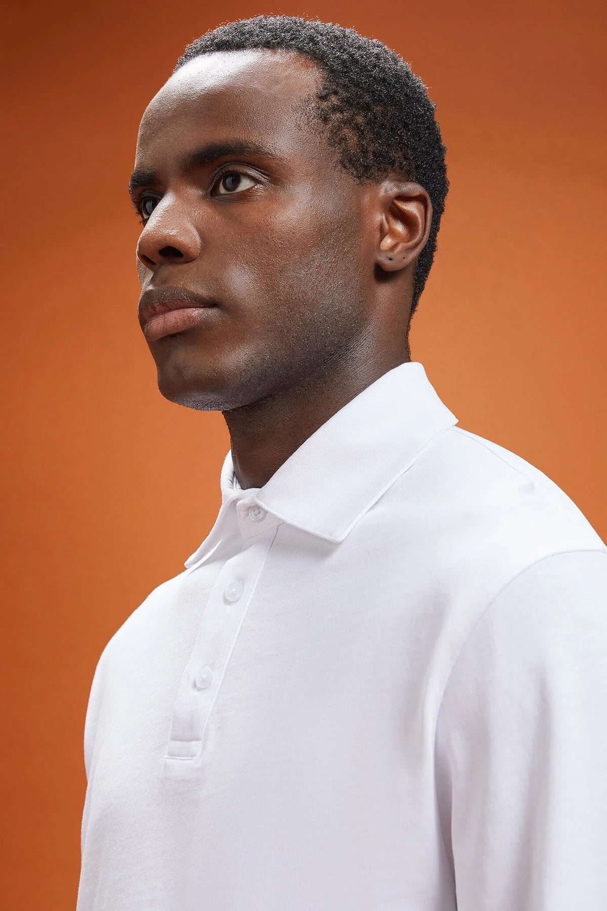 Men's long-sleeved 100% cotton polo shirt with a classic collar in a regular fit