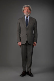 Single-breasted men's suit with single-pleat trousers in Prince of Wales check fabric Taupe