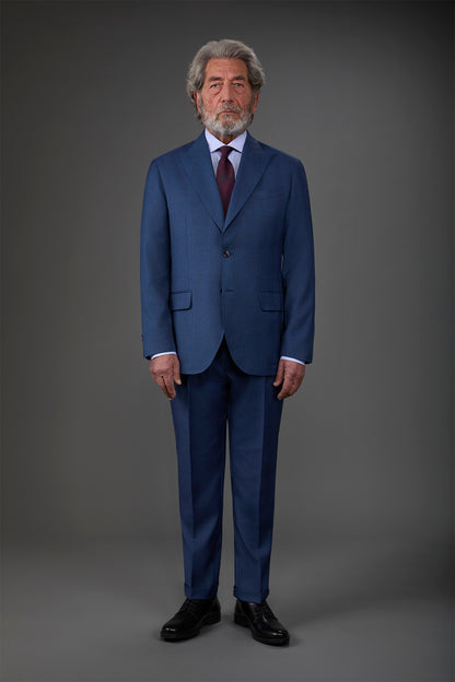 Single-breasted men's suit with single-pleat trousers in Prince of Wales check fabric