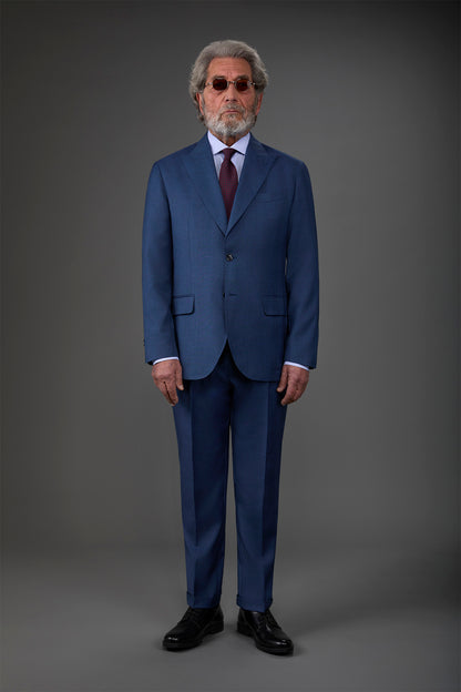 Single-breasted men's suit with single-pleat trousers in Prince of Wales check fabric