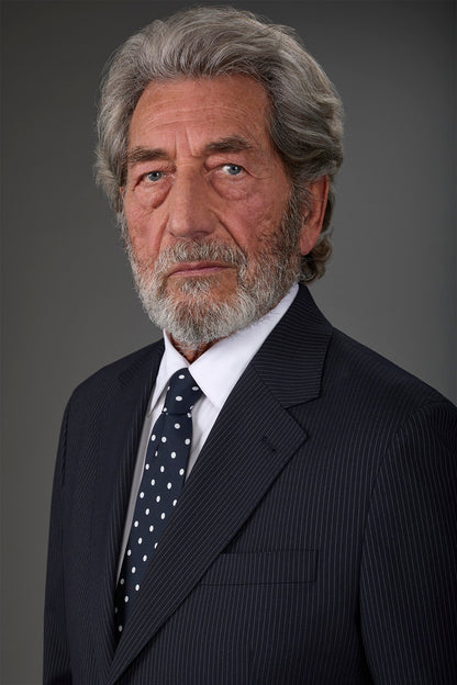 Single-breasted men's suit with flat front trousers in a pinstripe fabric