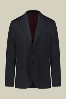 Single-breasted men's suit with flat front trousers in a pinstripe fabric