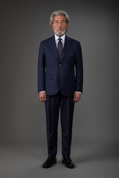 Single-breasted men's suit with classic single-pleat trousers, in pure combed wool with a semi-plain weave