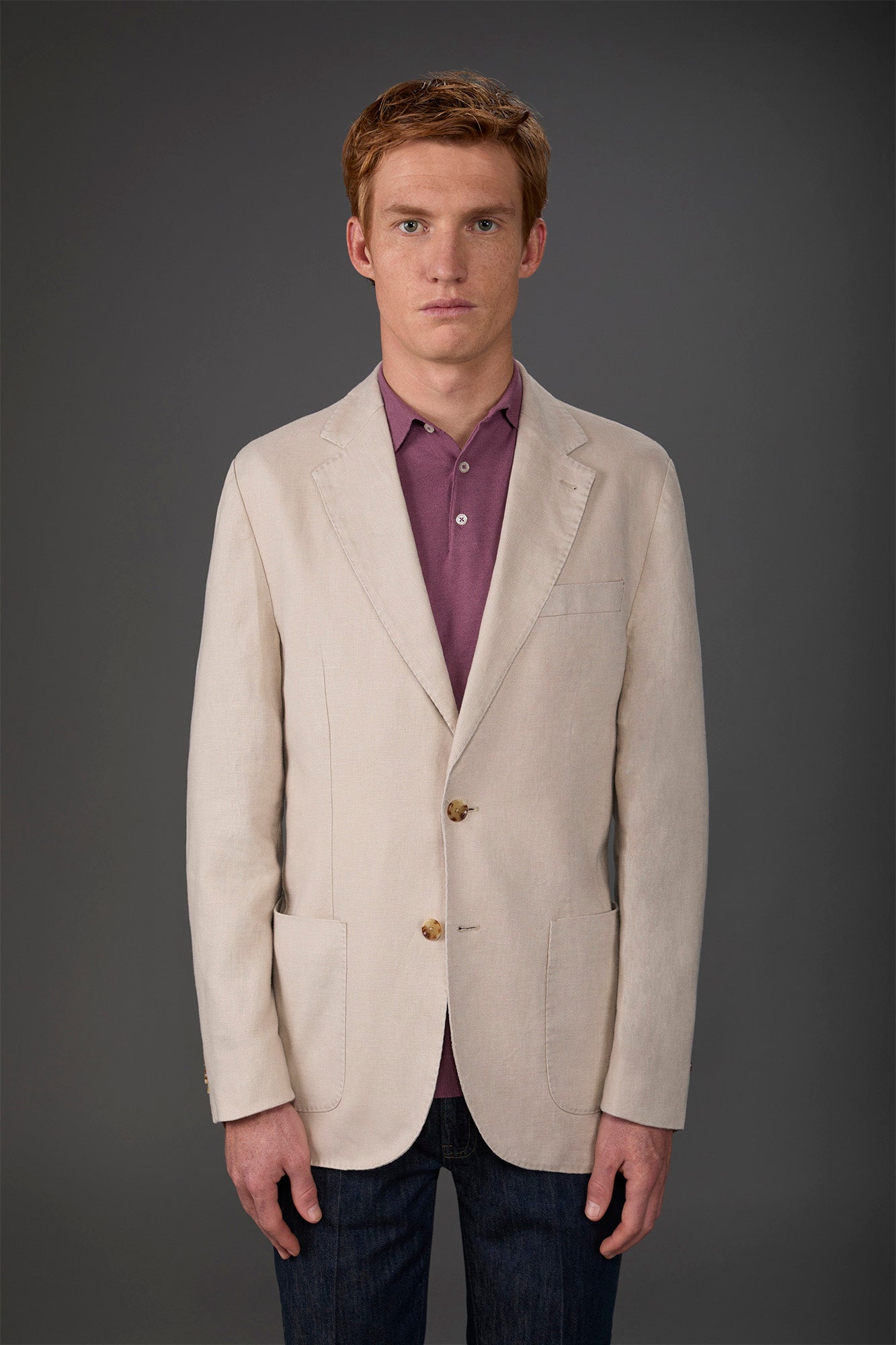 Men's unlined single-breasted jacket with classic lapels and patch pockets