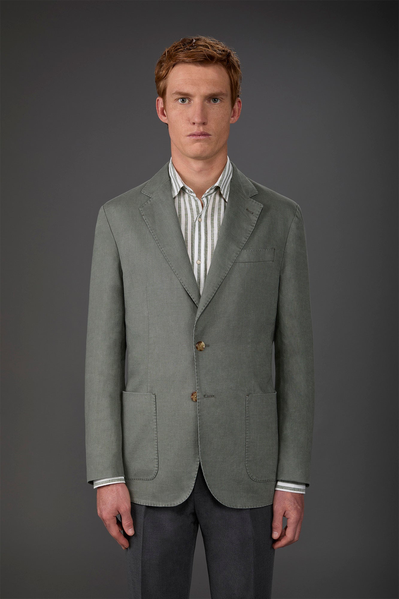 Men's unlined single-breasted jacket with classic lapels and patch pockets