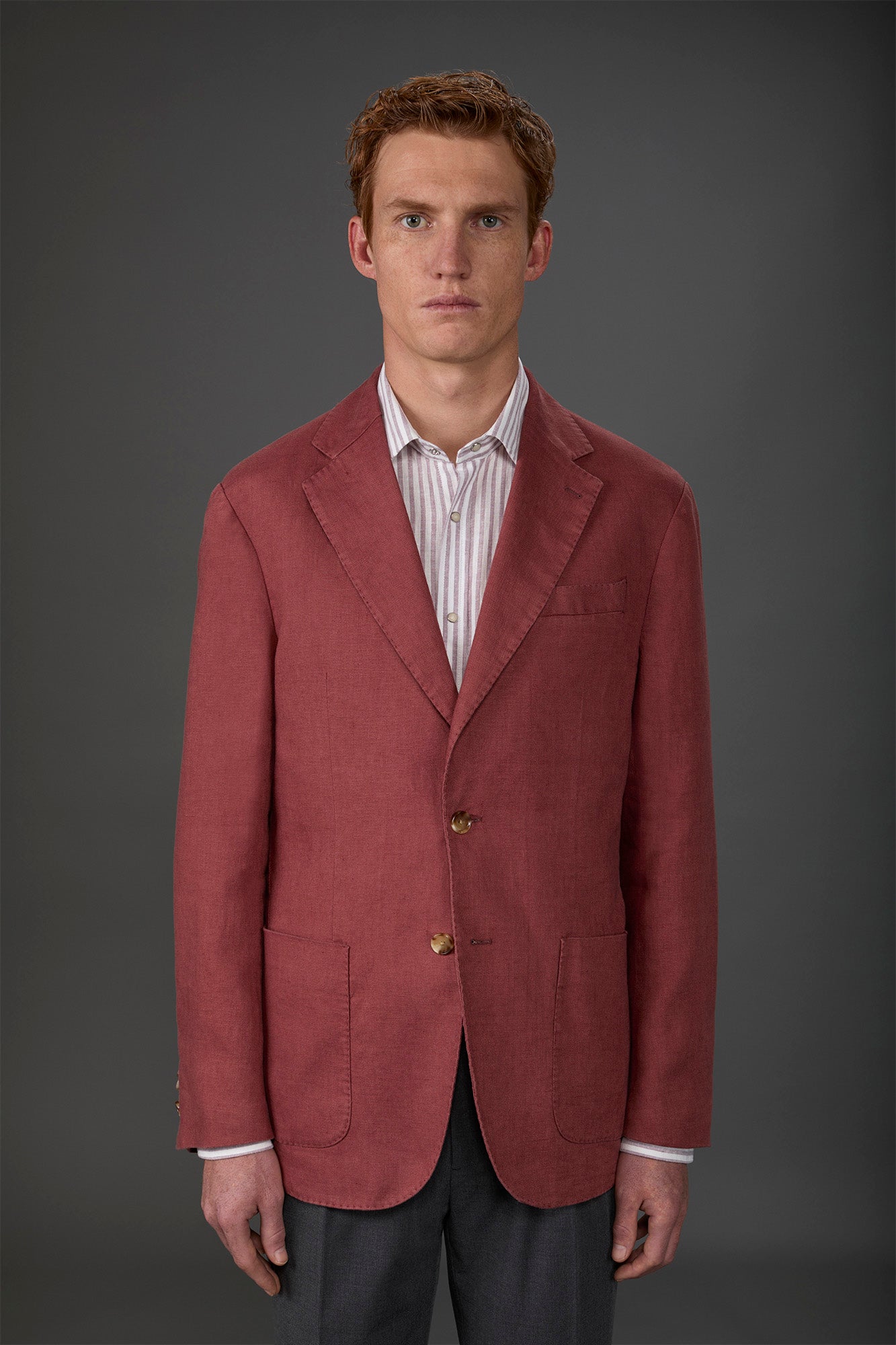 Men's unlined single-breasted jacket with classic lapels and patch pockets
