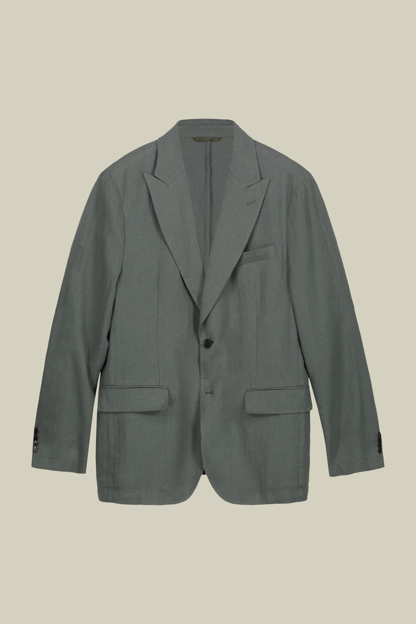 Men's unlined single-breasted jacket with peak lapels and flap pockets