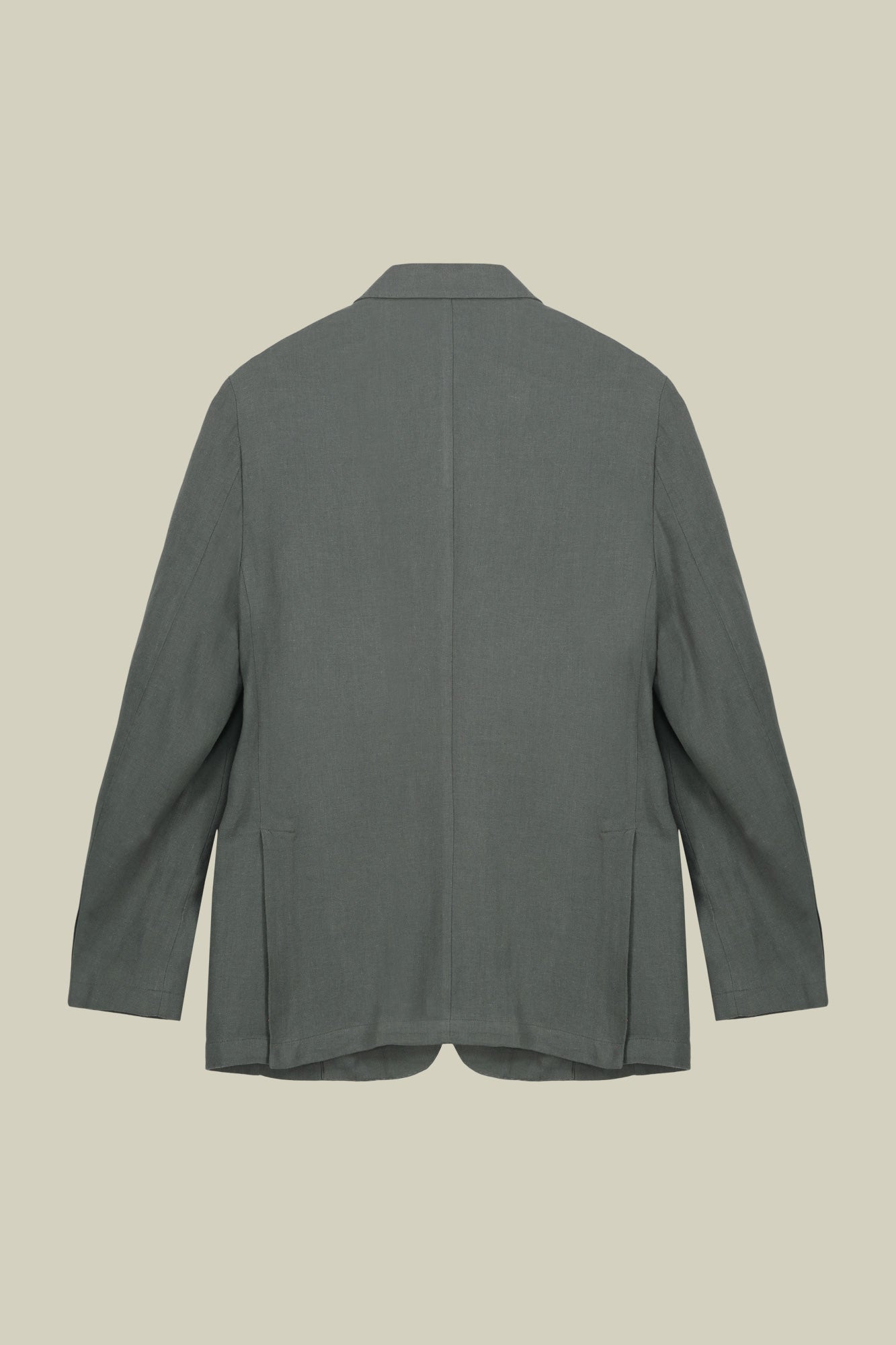 Men's unlined single-breasted jacket with peak lapels and flap pockets