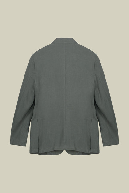 Men's unlined single-breasted jacket with peak lapels and flap pockets