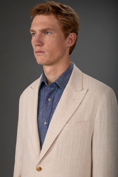 Men's unlined single-breasted jacket with peak lapels and flap pockets