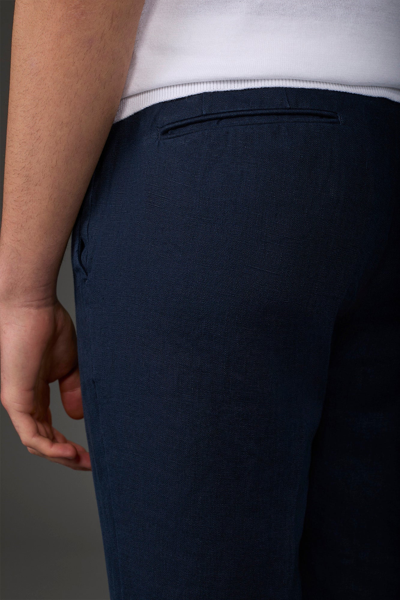 Men's trousers with two small pleats and concealed button