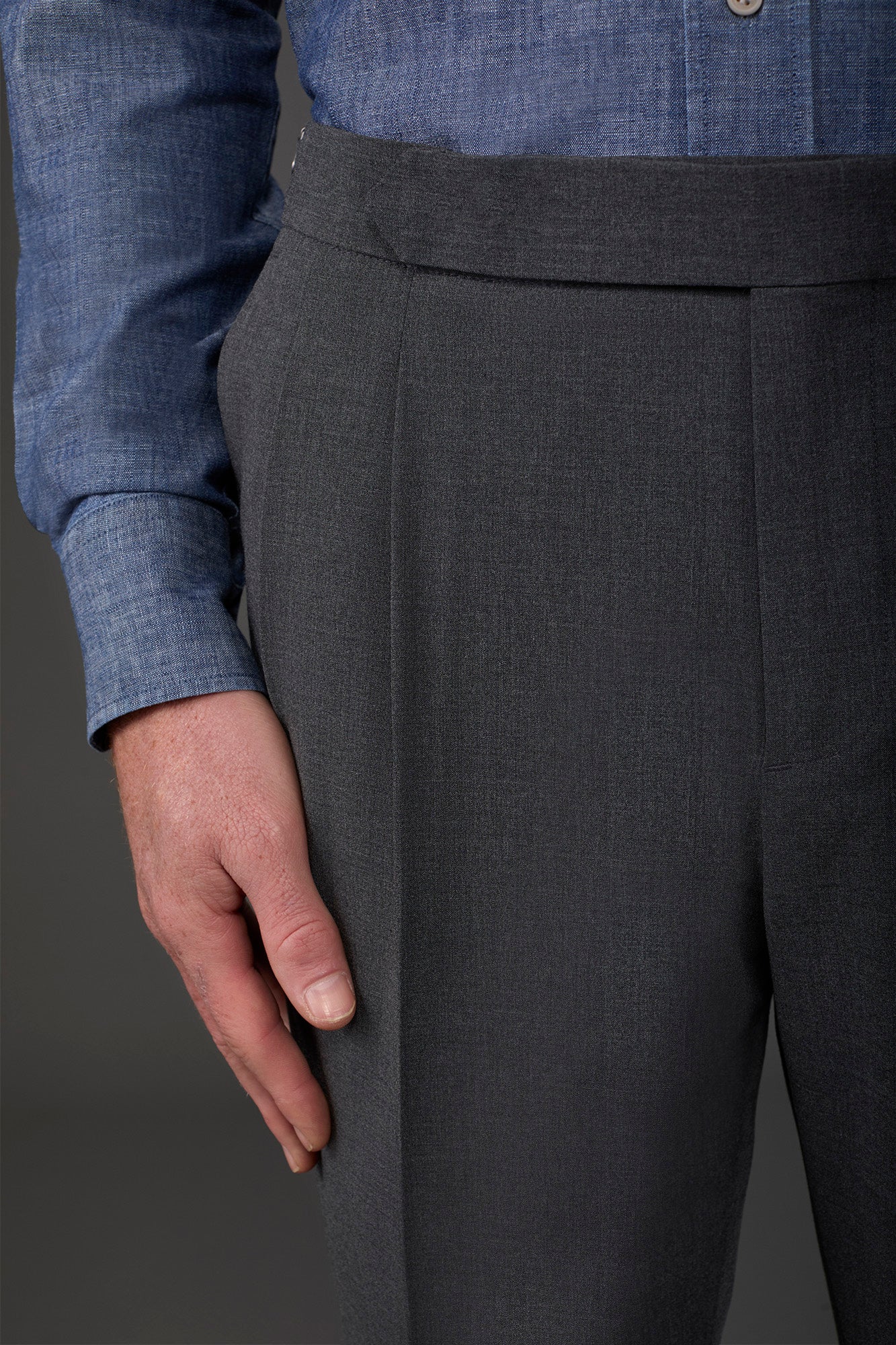 Men's trousers with double pleats and side buckles