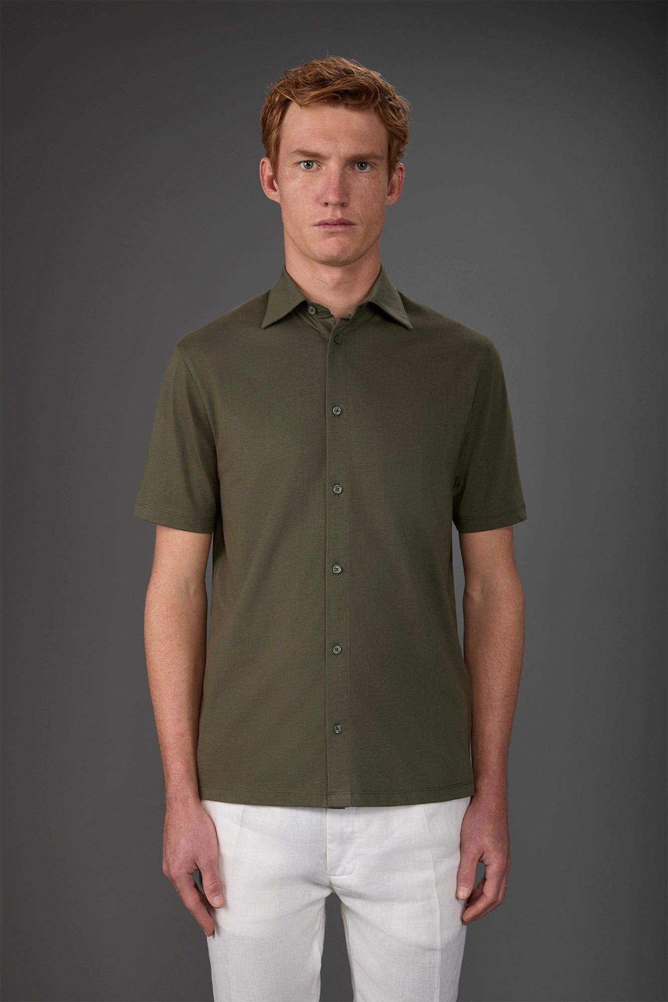 Men's short-sleeved polo shirt in 100% cotton jersey