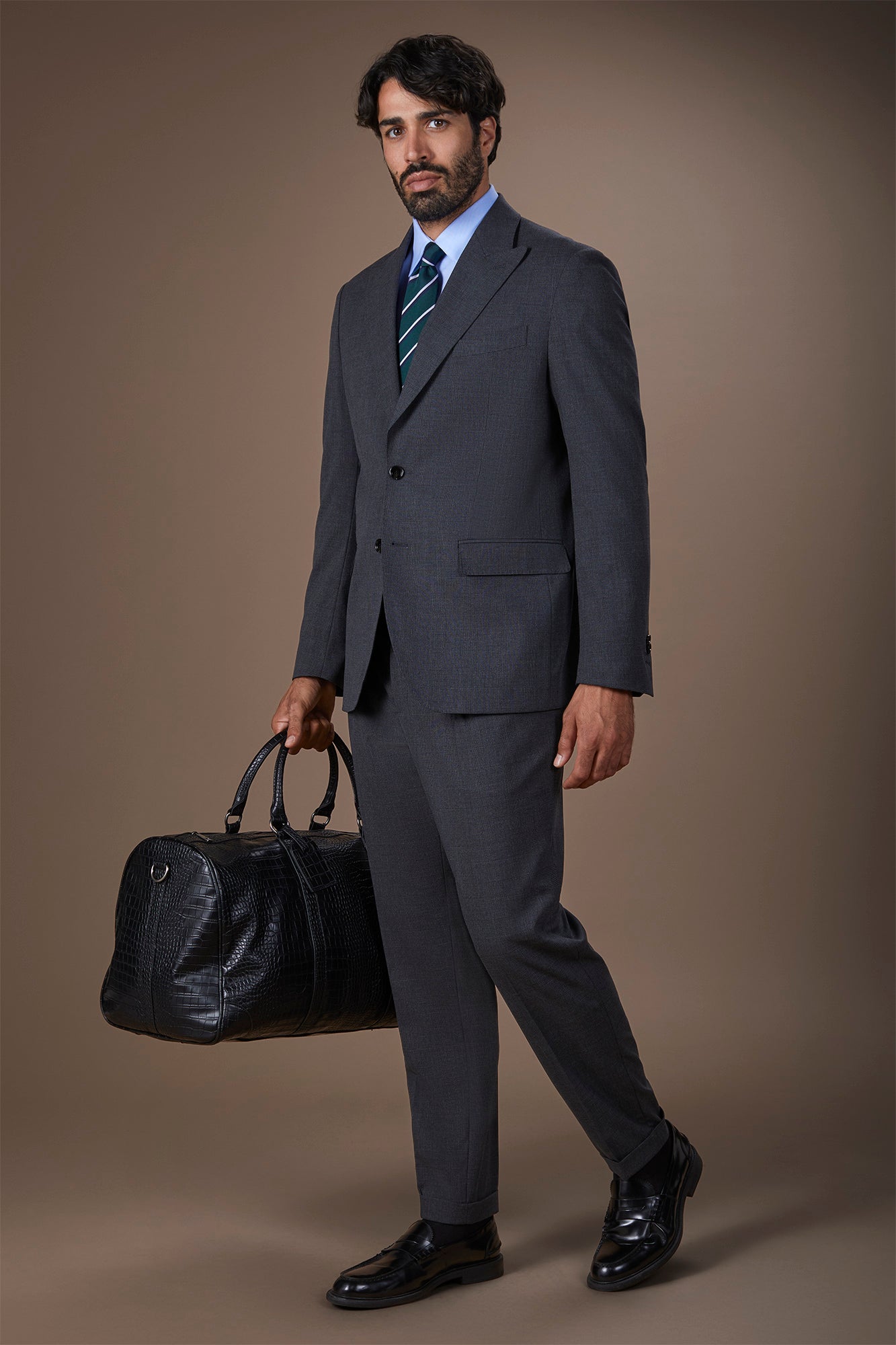 Men's suit with two-button jacket and peak lapel in Prince of Wales check