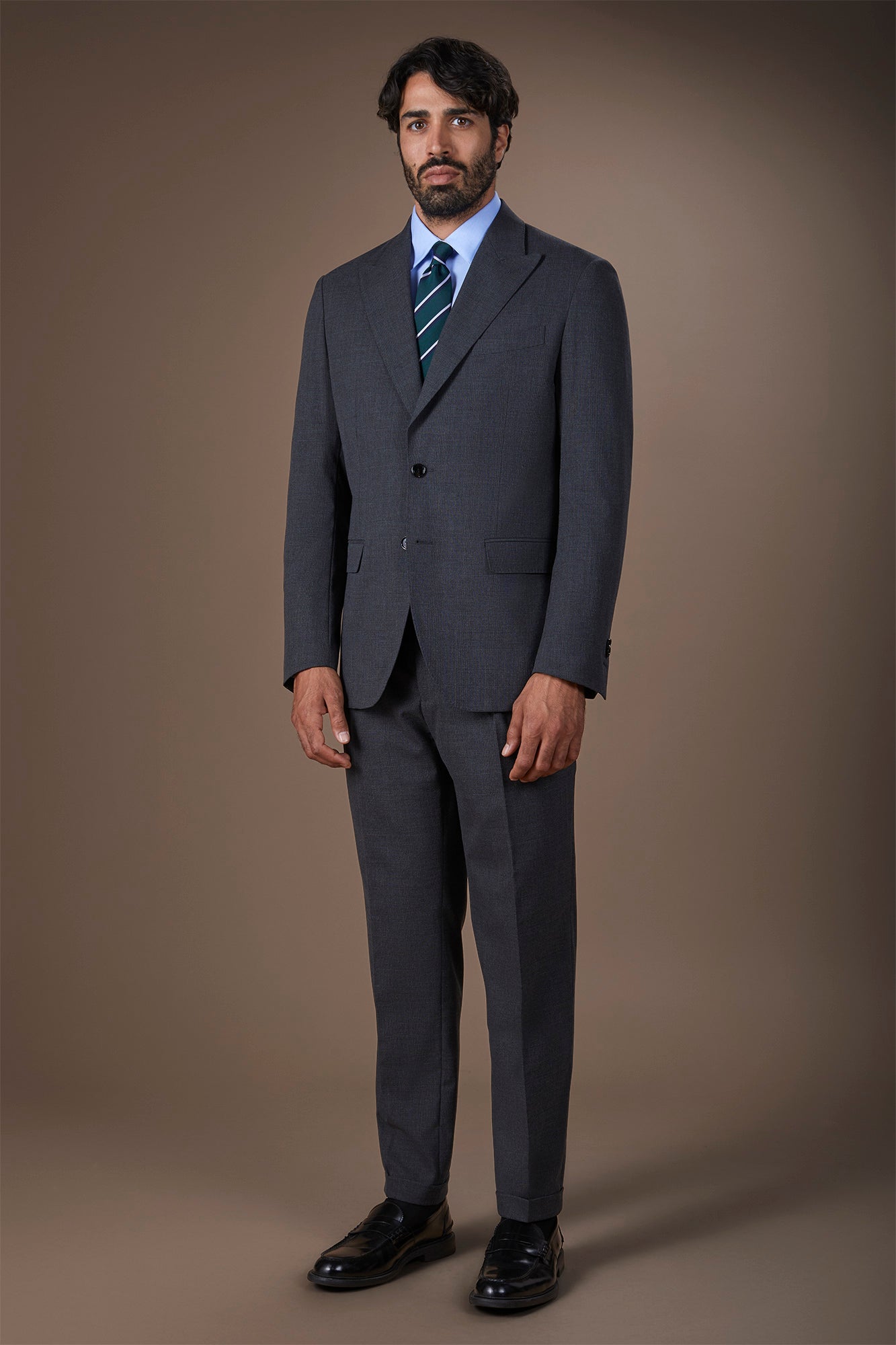 Men's suit with two-button jacket and peak lapel in Prince of Wales check