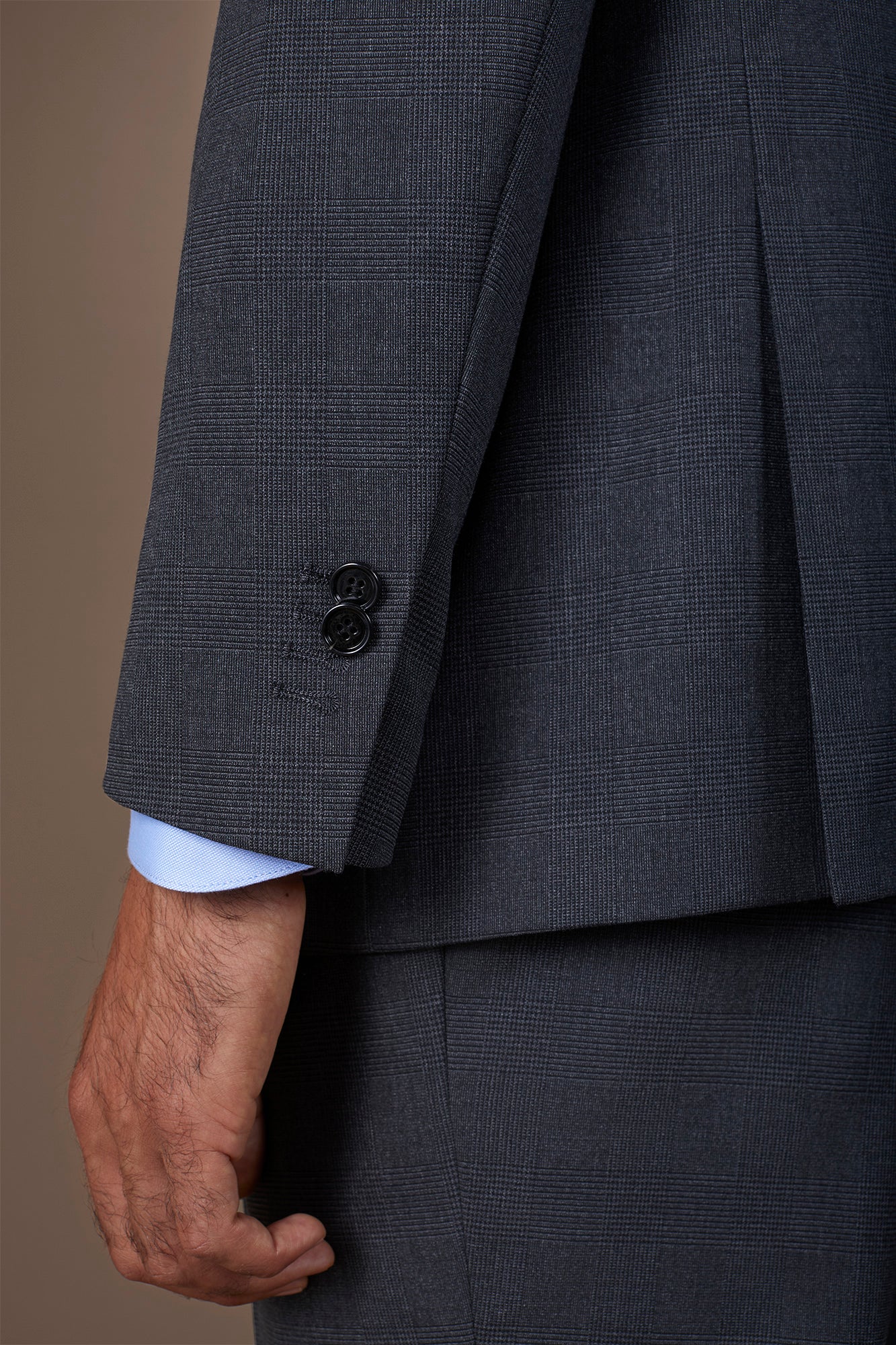 Men's suit with two-button jacket and peak lapel in Prince of Wales check