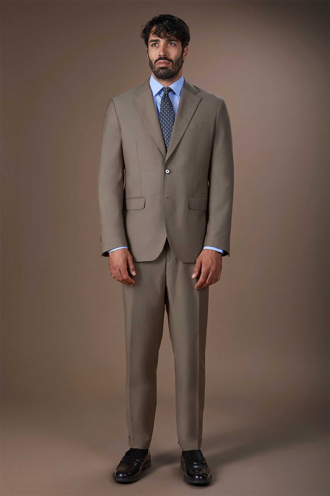 Men's single-breasted suit in herringbone fabric