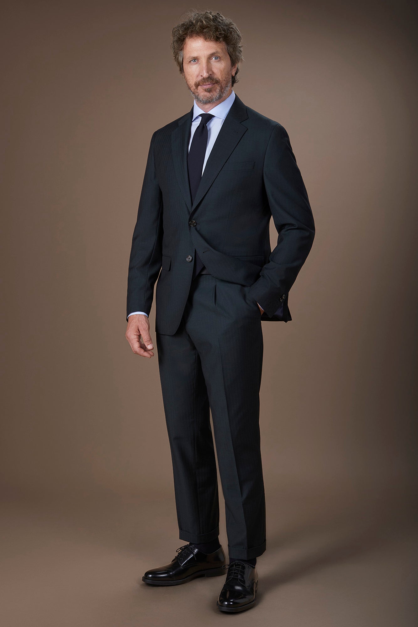 Men's single-breasted suit in herringbone fabric