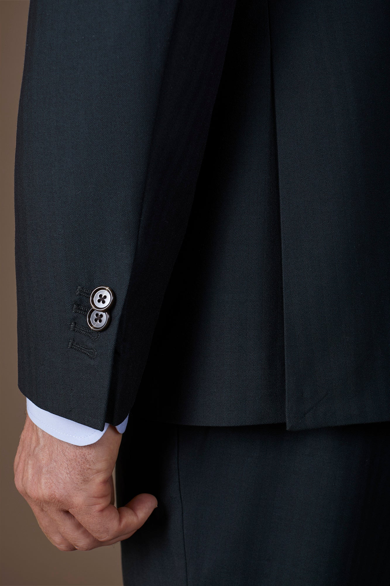 Men's single-breasted suit in herringbone fabric