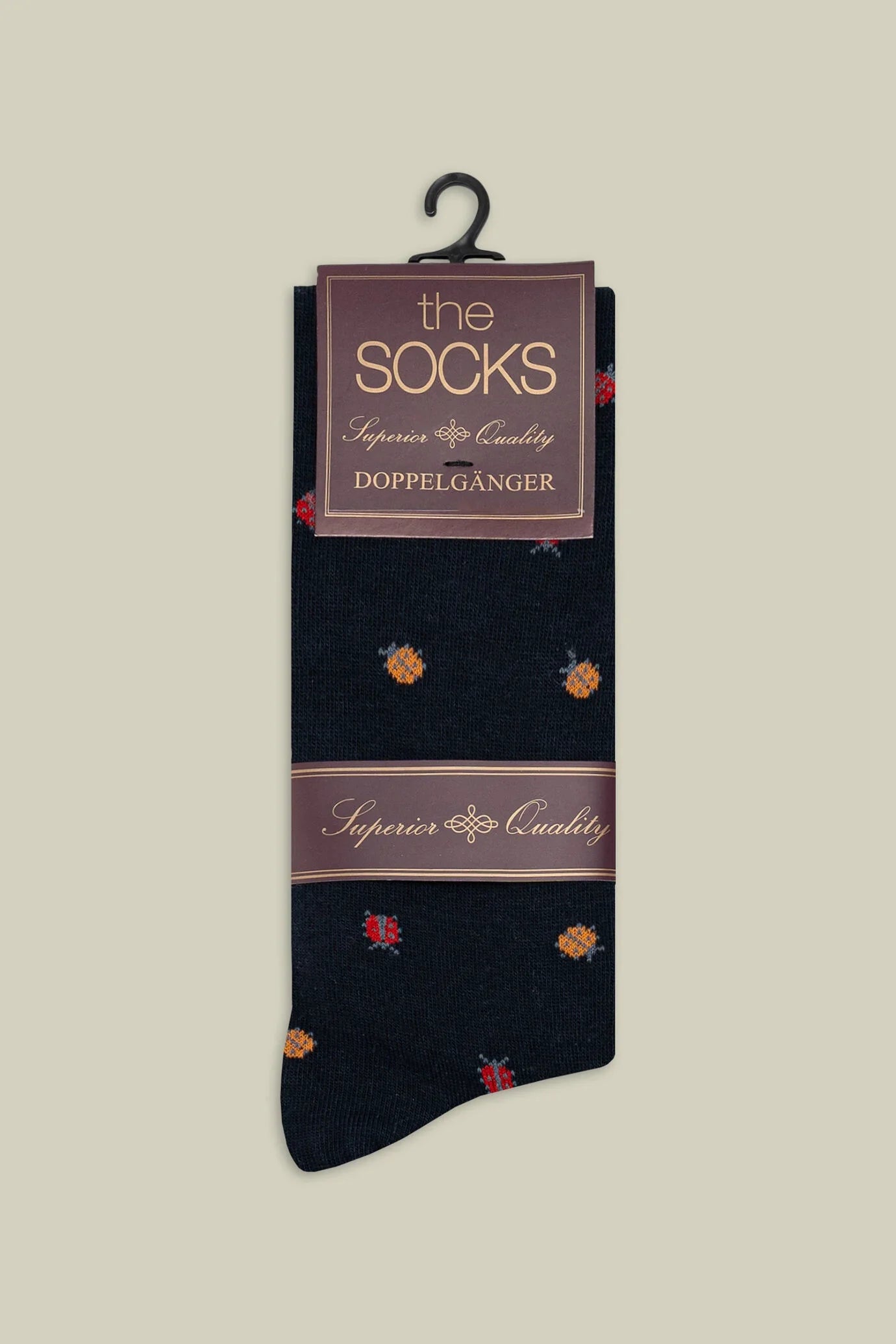 Men's plain knit socks with ladybird motif