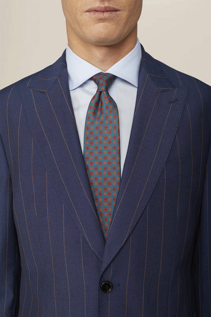 Men's pinstripe suit with double-pleated trousers and peak lapel jacket