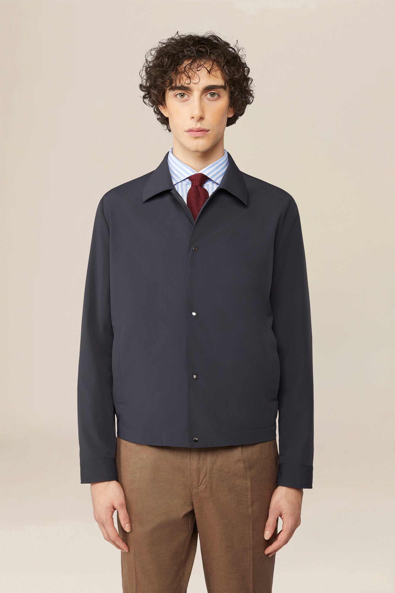 Men's nylon jacket with button fastening