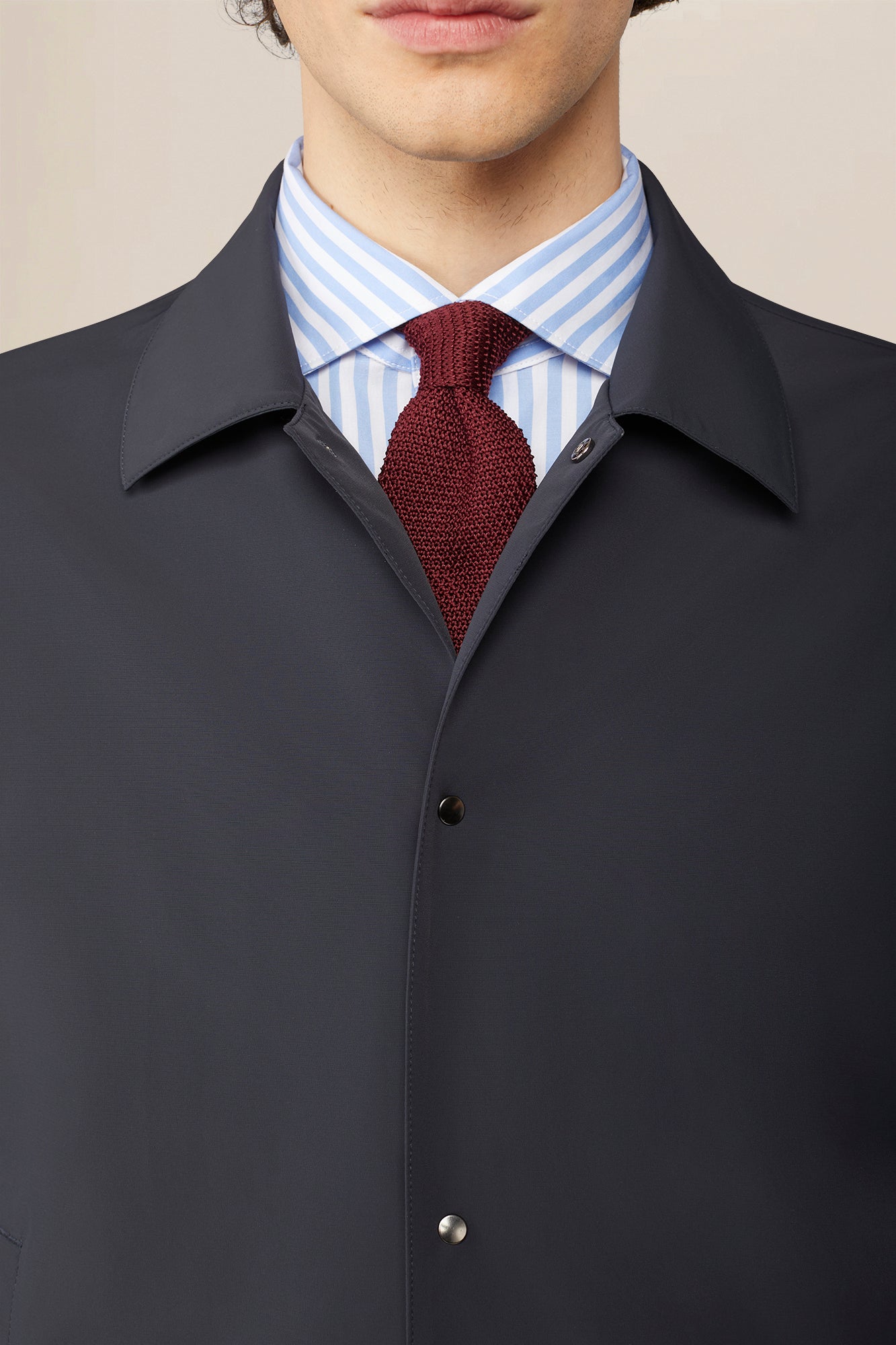 Men's nylon jacket with button fastening