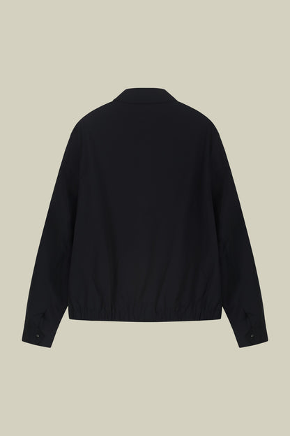 Men's nylon jacket with button fastening